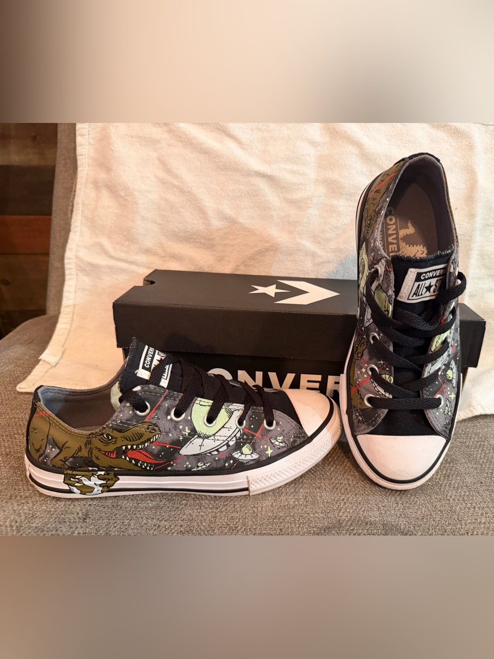 Converse All Star unique dinosaur graphics on the sneakers. Size 3